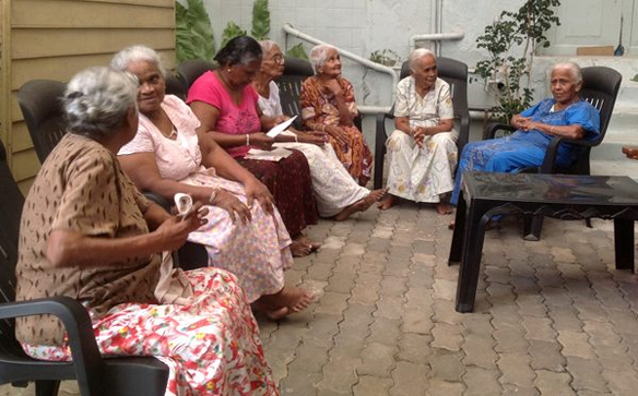 Residents talking together in the courtyard